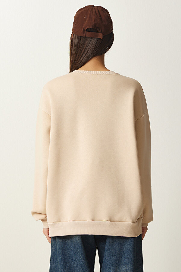 Miękka, bawełniana bluza w kolorze nude w haftowane serca.