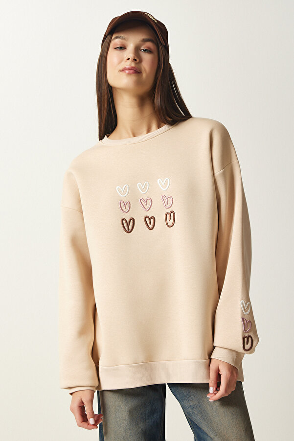 Miękka, bawełniana bluza w kolorze nude w haftowane serca.